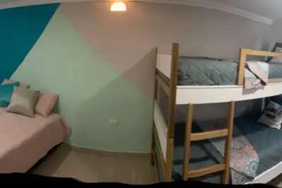 a room with two bunk beds and a bed at Apto en Getsemani el barrio mas cool de Cartagena in Cartagena de Indias