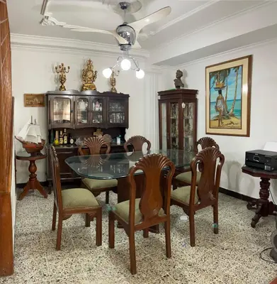 a dining room with a glass table and chairs at MAR uno in Cartagena de Indias