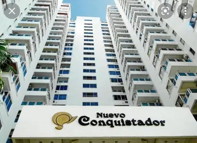 a large white apartment building with a nivegas condominium at Apartamento Lorenita in Cartagena de Indias