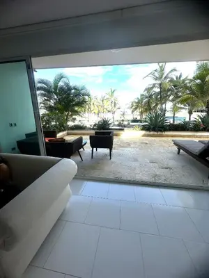 a living room with a view of a patio at Vista directa al mar con amplia terraza y 3 habitaciones in Cartagena de Indias