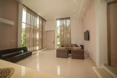 a large living room with couches and a television at La Bonita Luxury Ecohotel in Sahagún