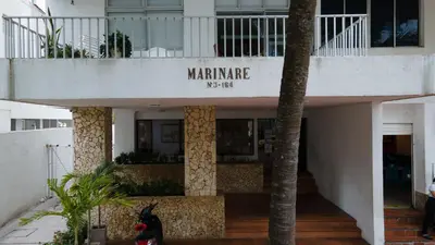 a building with a sign that reads marmite nova at APARTAMENTO MARINARE DE 2 HABITACIONES CON SALIDA DIRECTA A LA PLAYA in Cartagena de Indias