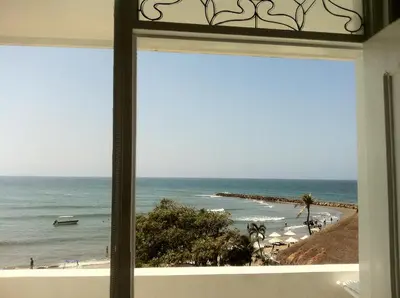 a view of the beach from a window at PLAYA LAGUITO in Cartagena de Indias