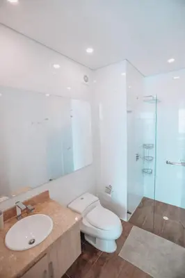 a bathroom with a toilet and a sink and a shower at Deluxe Spectacular Sunset in Santa Marta