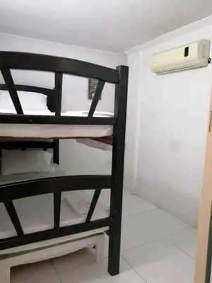 a bunk bed in a room with a bunk bed gmaxwell gmaxwell gmaxwell gmaxwell at La casita de max y tim apt 202 in Cartagena de Indias