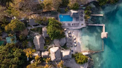 an aerial view of a resort in the ocean at Hotel Isla del Sol in Isla Grande