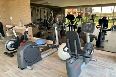 a gym with several different types of exercise equipment at Serena del Mar, Morros IO in Cartagena de Indias