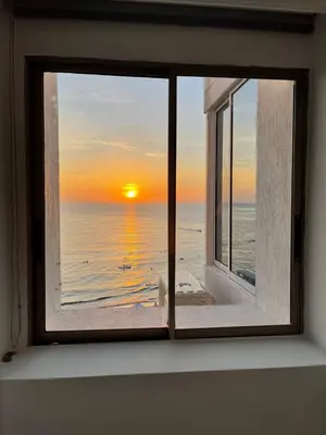 a window with a view of the ocean at Hermoso Apartamento, con vista al mar, en Cartagena de Indias, dos cuartos in Cartagena de Indias