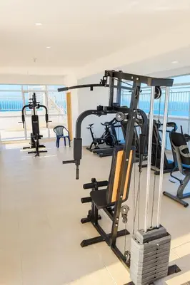 a gym with cardio equipment in a building at Luxury apartamento ubicación central y piscina. in Cartagena de Indias
