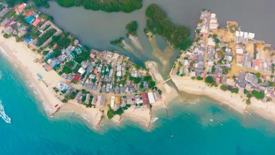 an aerial view of a small island in the ocean at Quatro palos in Rincón
