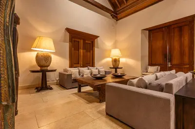a living room with couches and a table and lamps at Ananda Hotel Boutique in Cartagena de Indias
