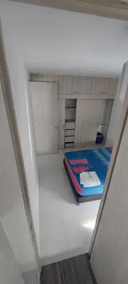 an overhead view of a room with a bed at HERMOSO APARTAMENTO CON BALCON, 3 Alcobas, 2 baños in Cartagena de Indias