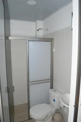a bathroom with a toilet and a sink at ZABDI COVEÑAS in Coveñas