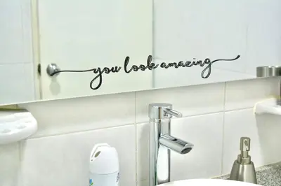 a bathroom with a sign that says you love amazing at Casa del Gato in Cartagena de Indias
