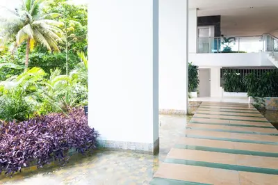 a hallway in a building with plants at 1 Bedroom Apartment Morros. Beach access in Cartagena de Indias