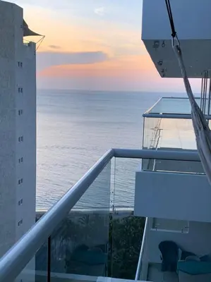 a view of the ocean from the balcony of a cruise ship at Edificio kuali apto 1704 in Santa Marta