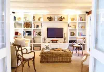 a living room with a tv and a couch at Hotel Casa Don Sancho By Mustique in Cartagena de Indias
