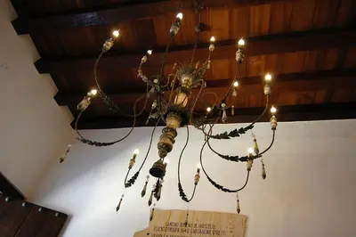 a chandelier hanging from a ceiling in a room at Hotel Casa Don Sancho By Mustique in Cartagena de Indias