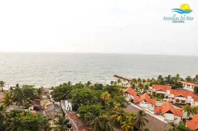 an aerial view of the ocean and houses at Arenillas del Mar in Tolú