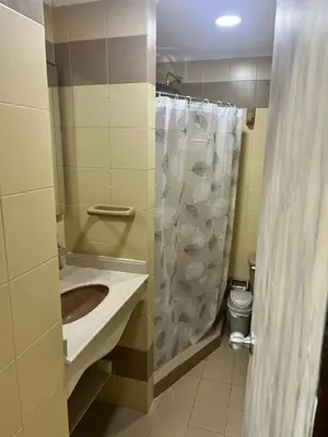 a bathroom with a sink and a shower at Espetacular vista mar y playa in Cartagena de Indias