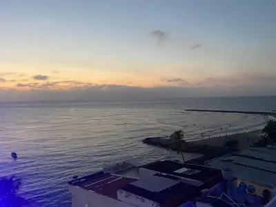 a view of the ocean at sunset at Vista al Mar Fragata Style in Cartagena de Indias