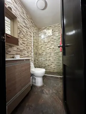 a bathroom with a toilet and a sink at Cabaña pescador de colores in Coveñas