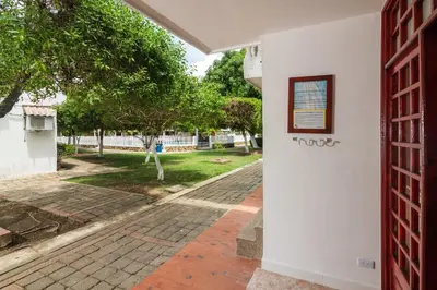 a view from the entrance of a house at Hermosa Cabana con Piscina 3 Habitaciones MC21 in Coveñitas
