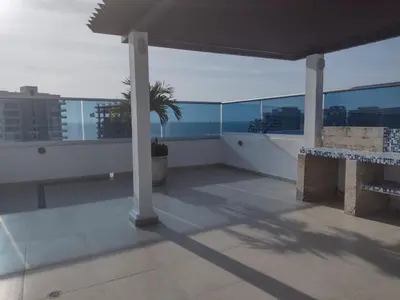 a balcony with a view of the ocean on a building at APARTAMENTO BELLO HORIZONTE in Santa Marta