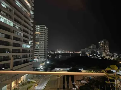 a view of a city at night with buildings at APTO DUPLEX Bella vista Piscina y buena ubicación in Cartagena de Indias