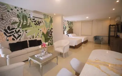 a living room with a couch and a table at Edificio Casa Tabor in Barranquilla