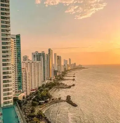 a view of a beach with buildings and the ocean at apartamento en bocagrande in Cartagena de Indias