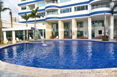 a large swimming pool in front of a building at apartamento en bocagrande in Cartagena de Indias