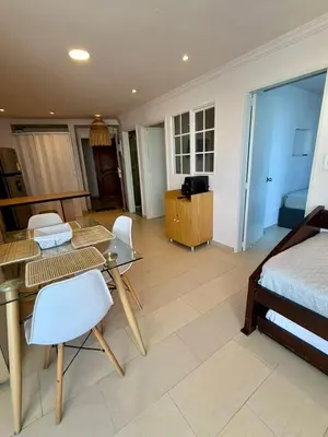 a bedroom with a bed and a table and chairs at CARTAGENA LA FANTASTICA in Cartagena de Indias