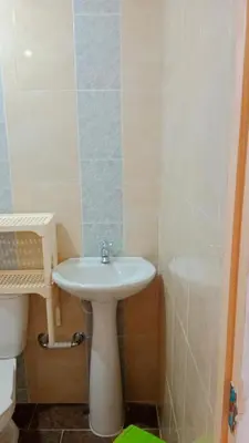 a bathroom with a white sink and a toilet at Apartamento Excelente Ubicación Cartagena - Nuevo Bosque - Seguridad in Cartagena de Indias