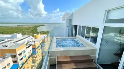a balcony with a swimming pool on a building at Penthouse en zona norte cartagena luxury con 3 habitaciones y excelente wifi in Cartagena de Indias