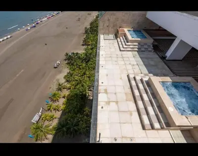 an overhead view of a beach with a swimming pool at Penthouse en zona norte cartagena luxury con 3 habitaciones y excelente wifi in Cartagena de Indias
