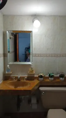 a bathroom with a sink and a mirror at Excelente vista al mar in Cartagena de Indias