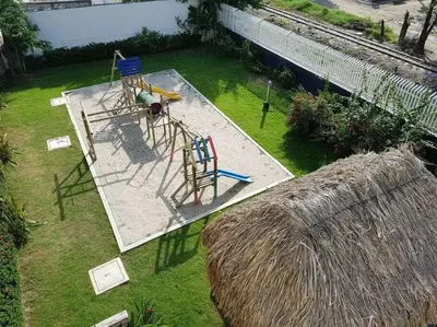 an aerial view of a playground in a yard at Hermoso apartamento. Cerca del mar. in Santa Marta