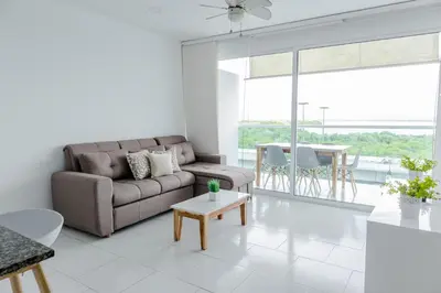 a living room with a couch and a table at apartamento 1 alcoba morros 922 rnt 132107 in Cartagena de Indias