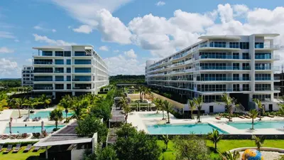 an aerial view of a resort with two tall buildings at !Condominio de Lujo! Playa + Piscinas + Natural in Cartagena de Indias