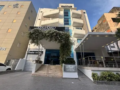 a building with a sign in front of it at Hotel Oxford Barranquilla in Barranquilla