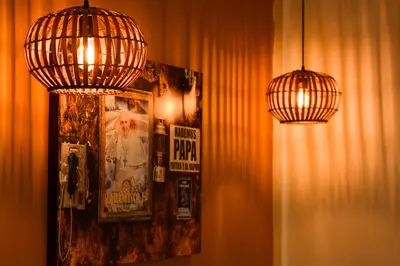a room with two lights and two posters on the wall at Casa Ebano 967 in Cartagena de Indias
