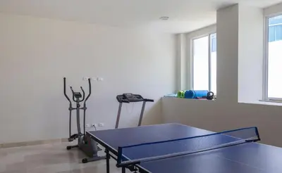 a room with a ping pong table in it at Luxury apartment, sector morros, vista y salida al mar edificio Sunshine in Cartagena de Indias