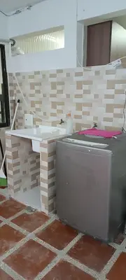 a bathroom with a tub and a sink in a room at Casa Para 3 a 12 personas in Cartagena de Indias