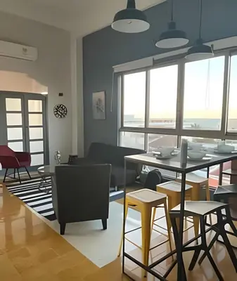 a living room with a table and chairs at 417 Apto con vista panorámica de cgna in Cartagena de Indias