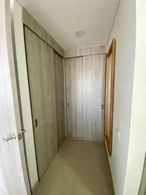 an empty hallway with a door and a room at Ocean Drive Beach House - Cartagena in Cartagena de Indias