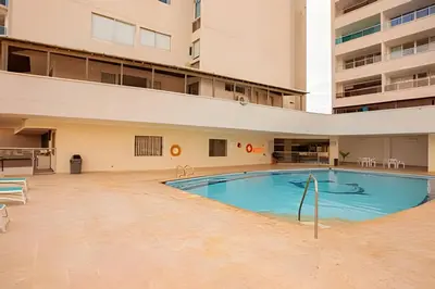 an empty swimming pool in an apartment building at Laurdhomes Laguito Loft , Hot Ware, 1Bath in Cartagena de Indias