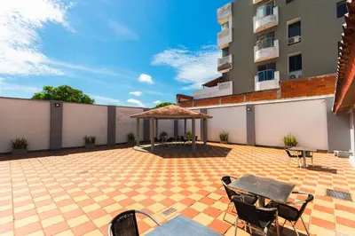 a patio with a gazebo on a building at Hotel Med Suites 94 in Barranquilla