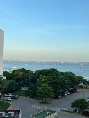 a parking lot next to a large body of water at Apartamento in Cartagena de Indias