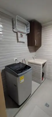 a small kitchen with a sink and a sink at Hermosa casa amoblada in Barranquilla